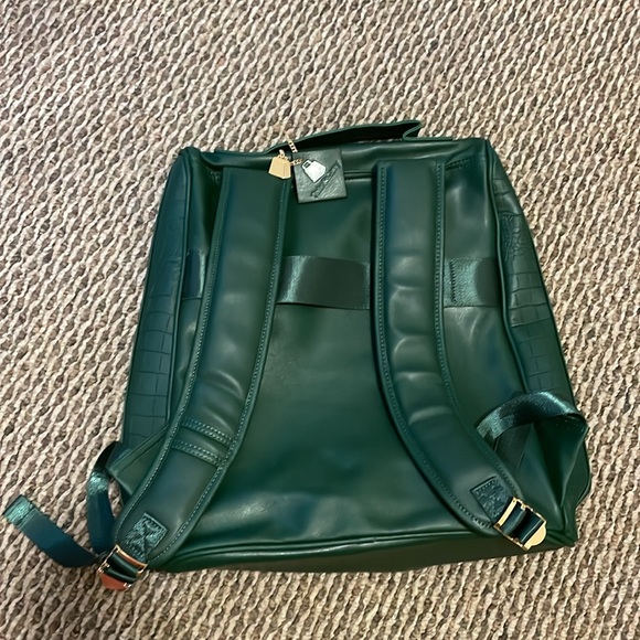Brand new Tote and Carry book bag ! With dust bag